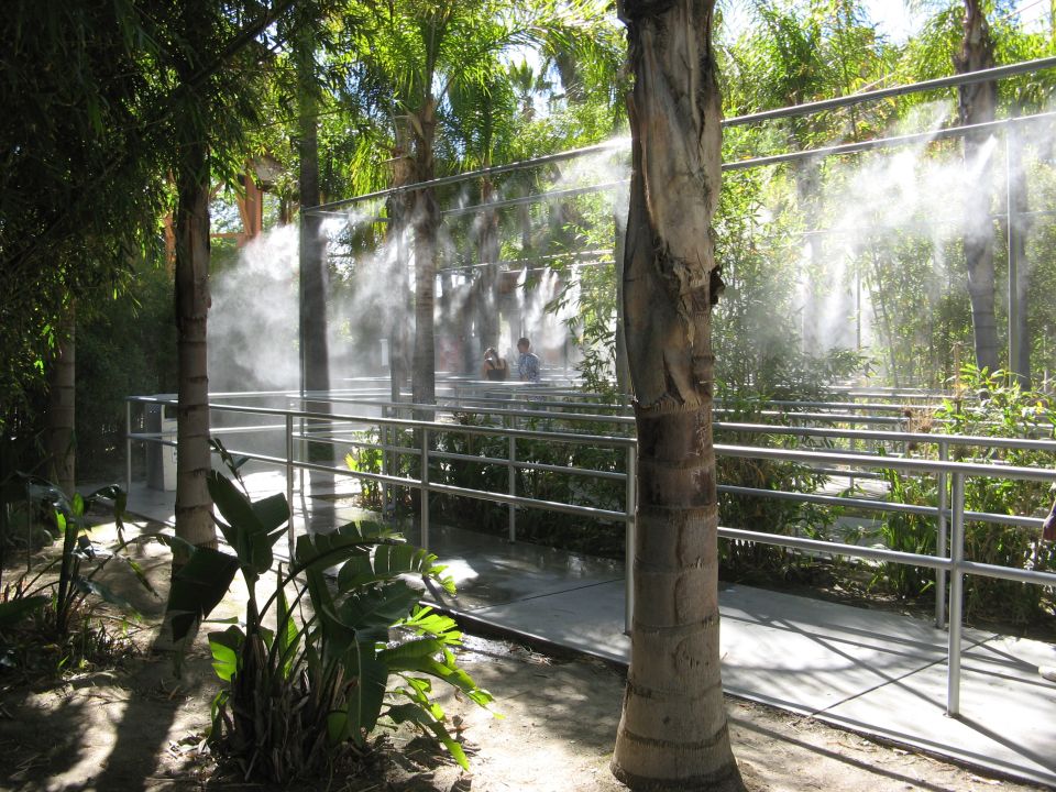 Pathway with misting system and tropical plants