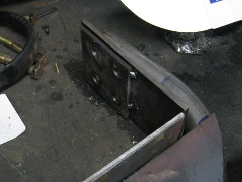 1996 Ford Bronco - Close-up of a fabricated metal bracket and tubing, likely for automotive repair or modification.
