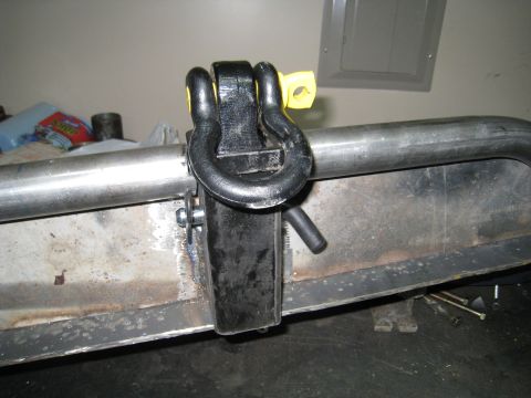 1996 Ford Bronco - Close-up of a tow hitch shackle mounted on a custom metal bumper.