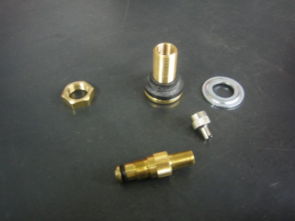 Valve stem parts including a nut, a stem, a washer, and a core