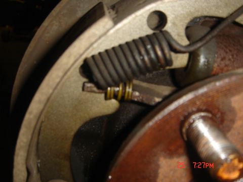 1965 Ford Ranchero - Detail of a vehicle's brake drum assembly, showing internal components.