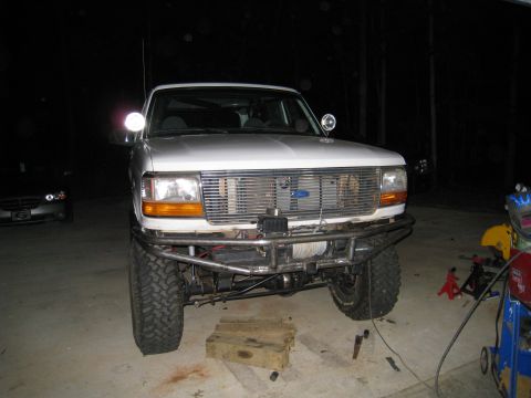 1996 Ford Bronco - 1996 Ford Bronco front end with a custom-built bumper and winch installed.