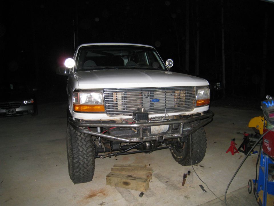 1996 Ford Bronco front view with custom metal bumper and winch