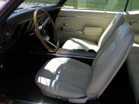 1969 Pontiac Firebird - Interior view of a 1969 Pontiac Firebird, highlighting the seats and dashboard details.