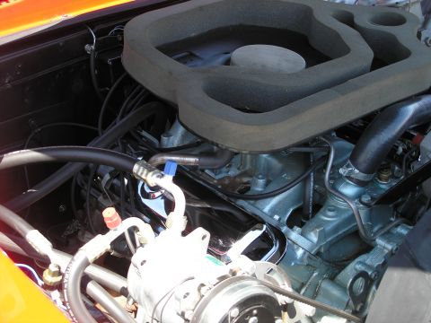 1969 Pontiac Firebird - Engine bay details, including air intake and various hoses and components.