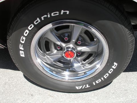 1969 Pontiac Firebird - Close-up of a BFGoodrich Radial T/A tire and a PMD wheel. The tire has white lettering.
