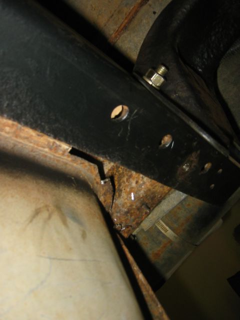 1995 Ford Bronco - how to get to the bolts for the rear shackles
