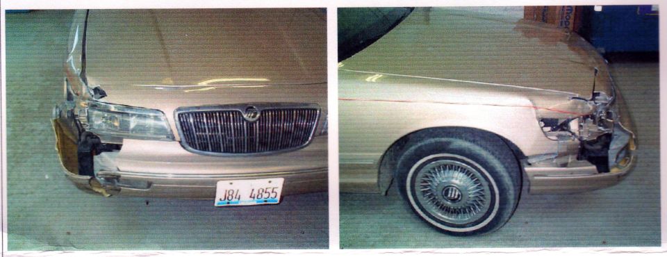 Gold Mercury Grand Marquis with front-end damage, showing grille and license plate J84 4855