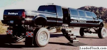 1991 Ford Crown Victoria - This custom limousine truck features unique text and graphics on its exterior.
