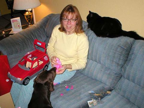 2003 Ford Escape - Look at all the picnic accessories. Ebony (cat) and Josephine are inspecting it as well.