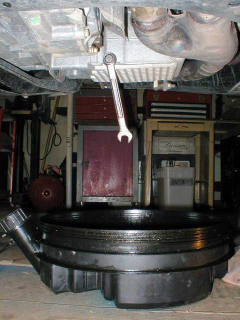 2003 Ford Escape - You'll need a 15mm box end, and a good drain pan.