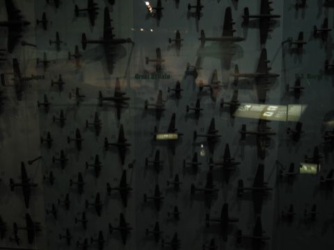 1991 Ford LTD Crown Victoria - backlit identification panel holds rows of small aircraft silhouette models grouped under labels like Japan and Great Britain.