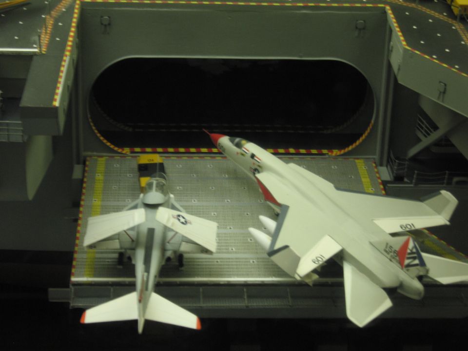 Top view of carrier model deck elevator with two white model jets