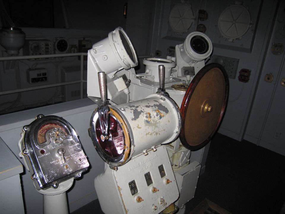 Ship gyrocompass binnacle and navigation instruments on a vessel bridge