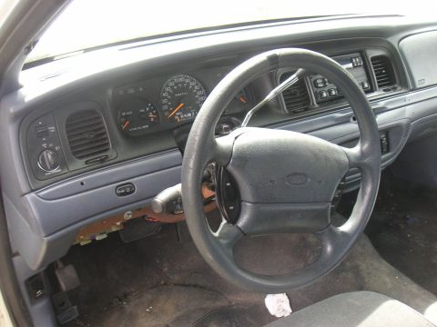 1997 Ford Crown Victoria - Interior view of a 1997 Ford Crown Victoria, showing the dashboard, steering wheel, and instrument cluster.