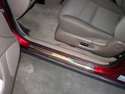 2003 Ford Escape - Here's a little classy enhancement as well as being very practical. We picked up a set of 4 stainless steel scuff guards from the local For…