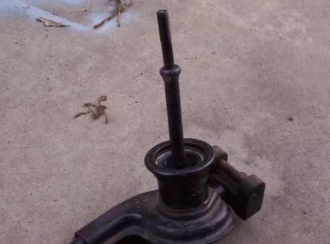 1995 Ford Probe - This appears to be a suspension part, possibly from a car, with a threaded rod.