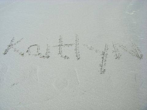 1994 Ford Explorer - The name Kaitlyn is written in the sand near the water's edge.