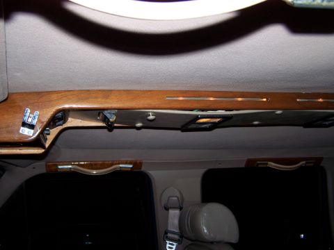 1995 Ford C-350 (Centurion Conversions) - The overhead console features wood trim and integrated LED lighting.
