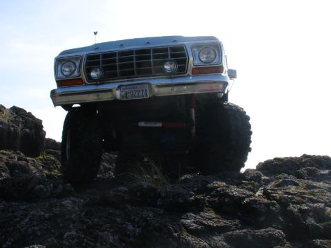 1978 Ford Bronco - 1978 Ford Bronco front view on rocky terrain.