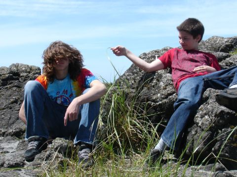 1978 Ford Bronco - Two boys relax on a rocky outcrop on a sunny day.