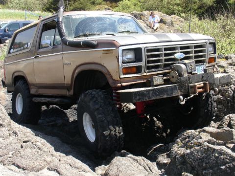 1978 Ford Bronco - This modified Ford Bronco navigates a rocky trail with a snorkel and winch attached.