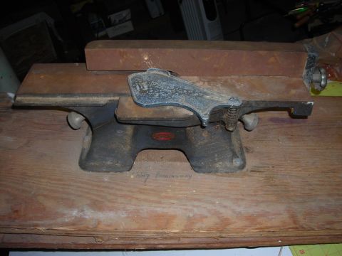 1995 Ford Bronco - This is a close-up view of a vintage wood jointer, likely used for woodworking projects.