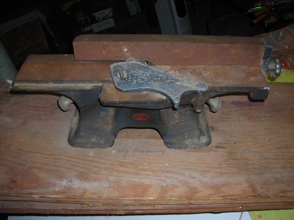 old wood jointer on a workbench