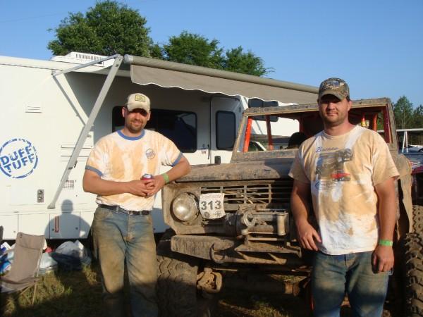 Mud-covered 1978 Ford Bronco with winch and number 313 plate