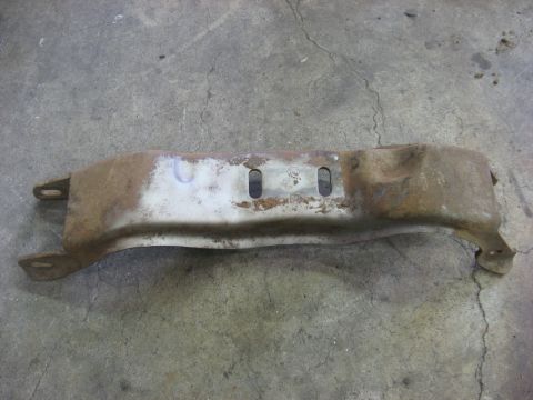 1978 Ford Mustang II - This is a rusted metal bracket, likely a component from a vehicle's undercarriage.