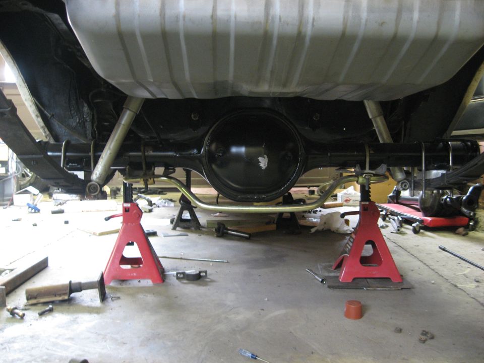Rear axle assembly and fuel tank on jack stands