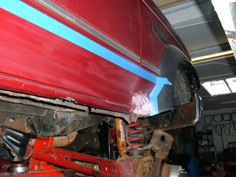 1994 Ford Bronco - Rust repair in progress on the side panel of a 1994 Ford Bronco.