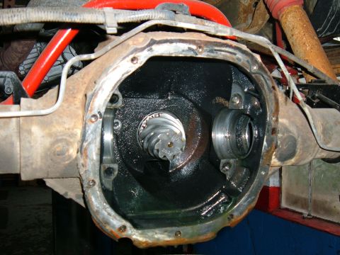 1994 Ford Bronco - Close-up of an open differential housing with internal gears visible.