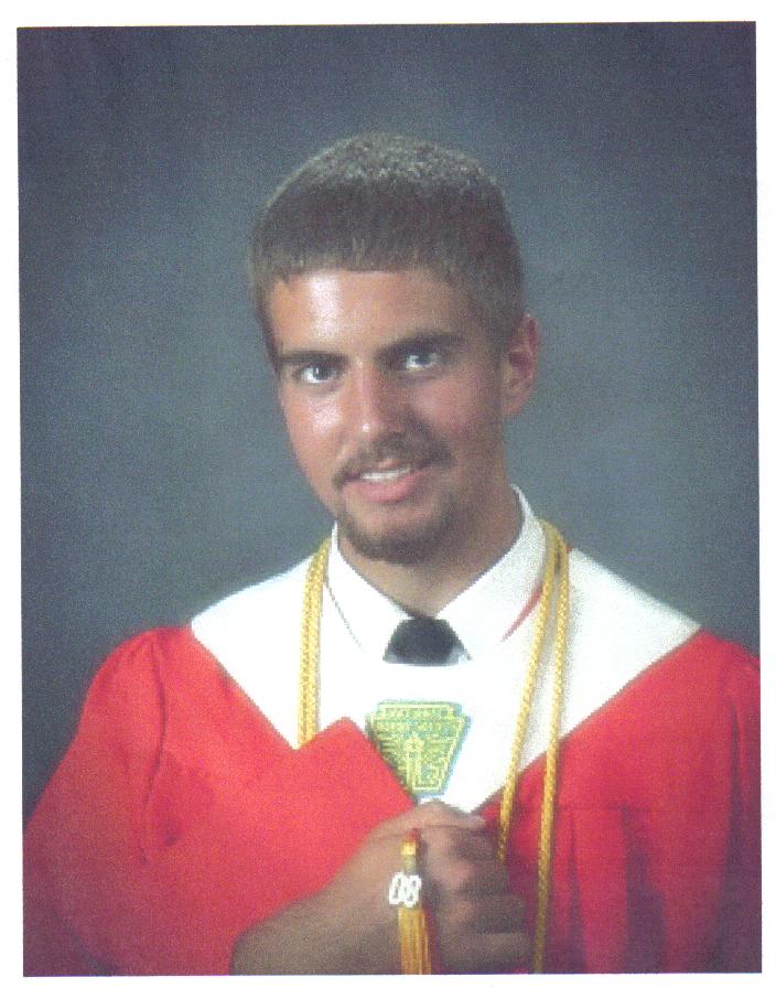 guy in graduation gown with tassel that says 08