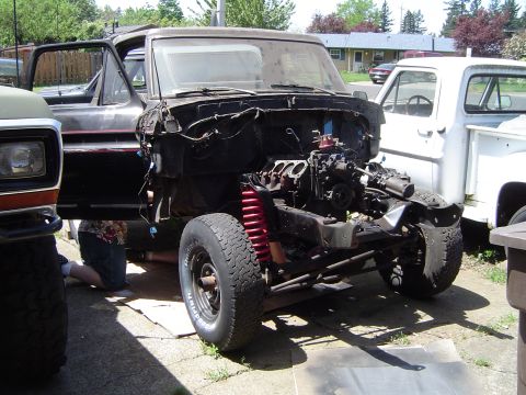 1979 Ford Bronco - Got the boys under there to help get the drivetrain out.
