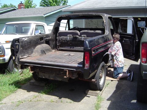 1979 Ford Bronco - Jacob helping pull the bench seat