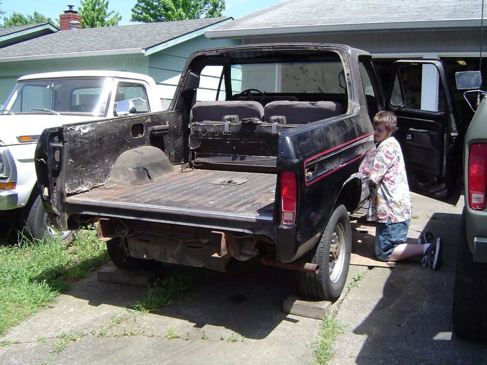 Jacob helping pull the bench seat