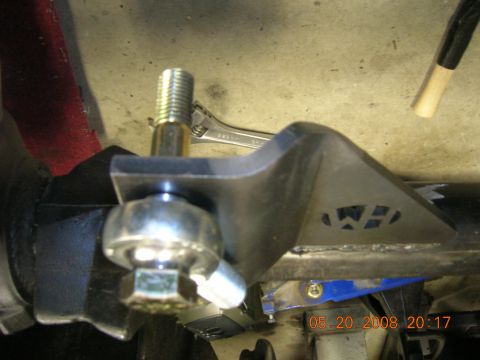 1996 Ford Bronco - A close-up view of a vehicle's suspension component, possibly undergoing maintenance or modification.