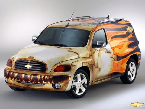 1991 Ford Crown Victoria - This modified Chevrolet HHR features a distinctive shark-themed front end and fiery graphics along its body.