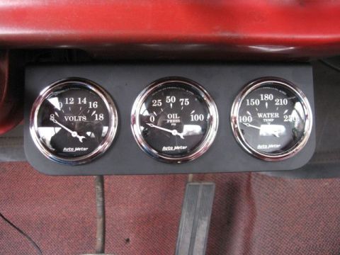 1966 Ford F-100 - Dashboard with Auto Meter gauges for voltage, oil pressure, and water temperature.