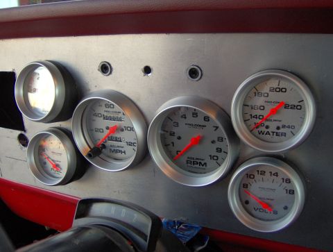 1978 Ford Bronco - Custom dashboard gauges with Pro-Comp Ultra-Lite meters for speedometer, tachometer, fuel, water temperature, and voltage.