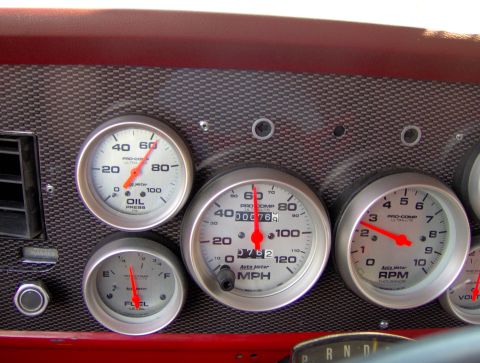 1978 Ford Bronco - Custom dashboard gauges including speedometer, tachometer, oil pressure, and fuel level indicators.