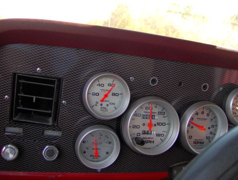 1978 Ford Bronco - Custom dashboard features Pro-Comp gauges for oil pressure, fuel level, speedometer, and RPM.