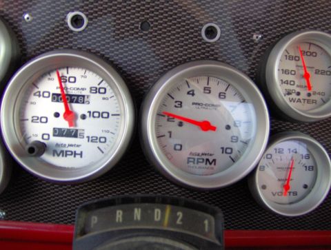 1978 Ford Bronco - Custom dashboard with multiple Auto Meter gauges and a PRNDL selector.