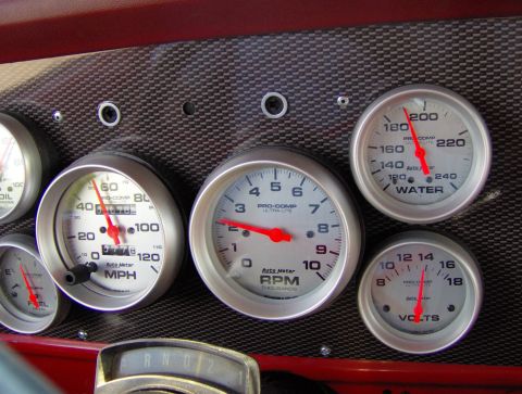 1978 Ford Bronco - A collection of Auto Meter gauges are visible on the dashboard, indicating various vehicle functions.