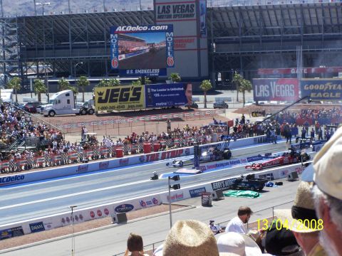 1973 Ford Mustang - Two dragsters are poised at the starting line of a race at the Las Vegas Motor Speedway.