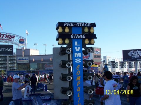 1973 Ford Mustang - A drag racing tree stands tall at a speedway, with spectators gathered around. The date stamp indicates it was taken in 2008.