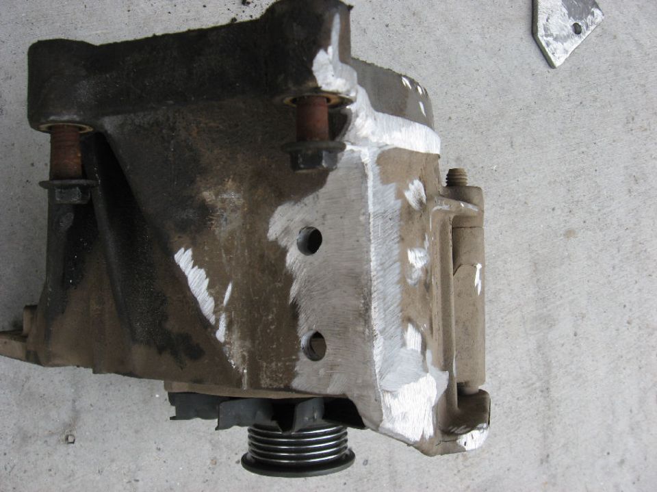 Modified metal bracket with pulley on concrete