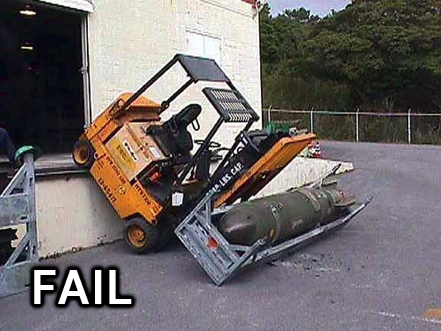 2000 Mercury Grand Marquis - A forklift appears to have failed its task, dropping a bomb onto the ground.