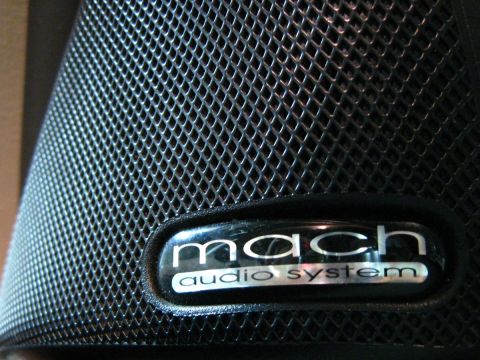 2003 Ford Taurus - MACH logo on tweeter grille.